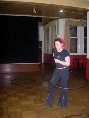 Charlie practices with a hula hoop