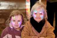Two girls with painted faces