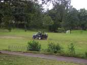 Mowing the grass in Abbeyfield Park.