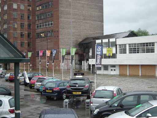 Savile Street under fast moving water, 6:55pm.