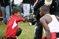 A child tries out boxing