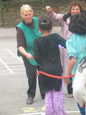 Mrs Keen joins pupils in the playground