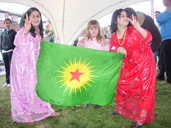 Kurdish women and flag