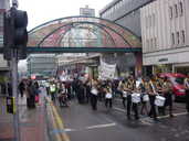Marchers Passing Castle-Gate and Haymarket Galleries