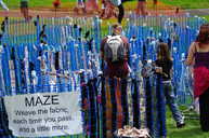 People entering colourful maze.