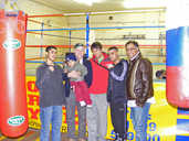 Brendan Ingle, with baby Gabriel, Moshin Khan (second from the right), Hafeas Rehman (right) talk to the Messenger’s Brent Moya (centre).
