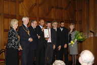 Jon Ekwibiri receives his award