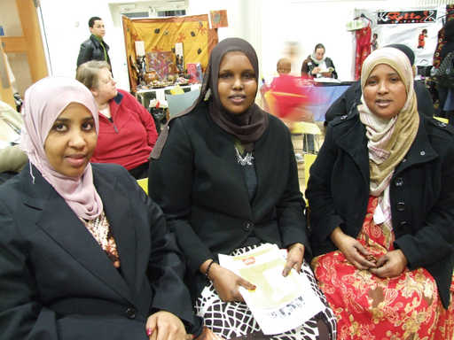 Women enjoy the celebration at the Vestry Hall