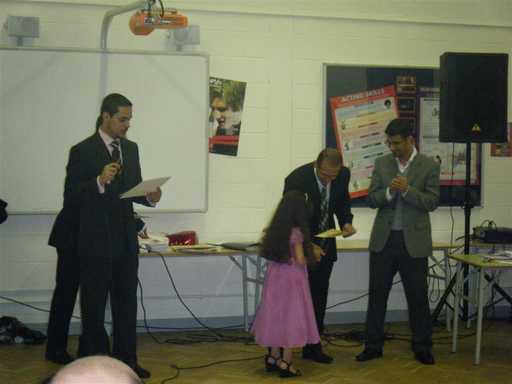 A student receives a certificate