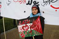 Young woman with her placard on the Gaza march