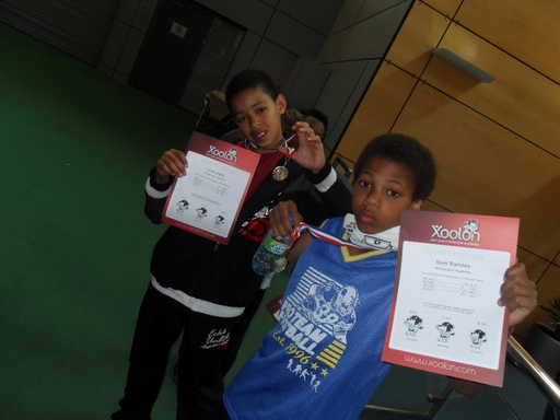 Young people show off their awards