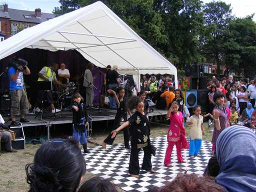 Desi Twist dancers on stage