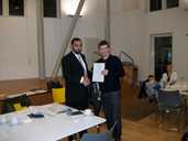 Councillor Hussain awarding certificate to Mark Butler