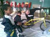 Young people learned how to fix their own bikes