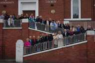 Interfaith marchers line up on St Catherine's Church steps