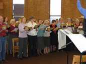 Choir members in full flow